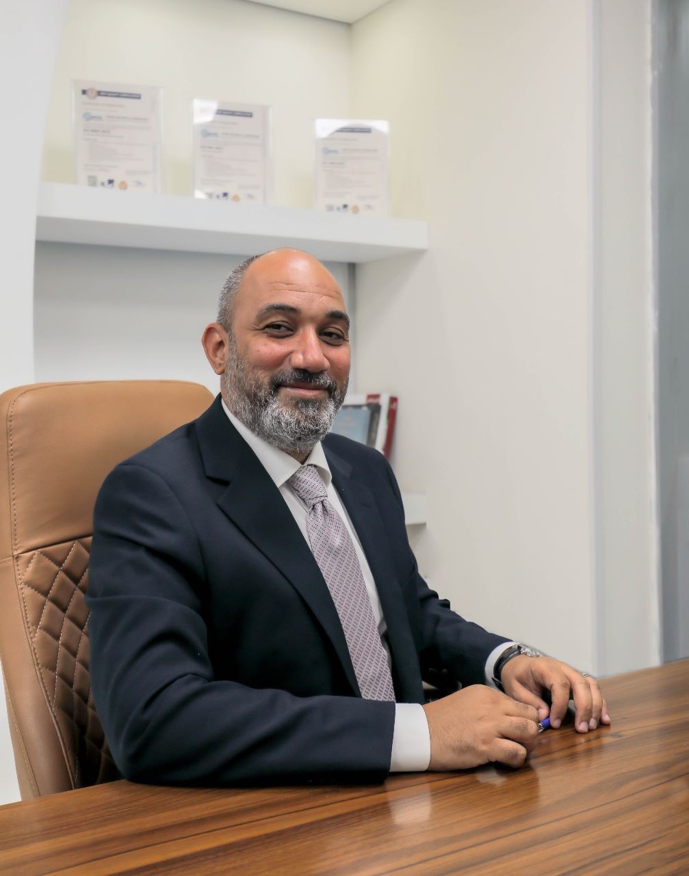 Engr. Saker Aljbour, Managing Director of Syrino Electromechanical, at his desk